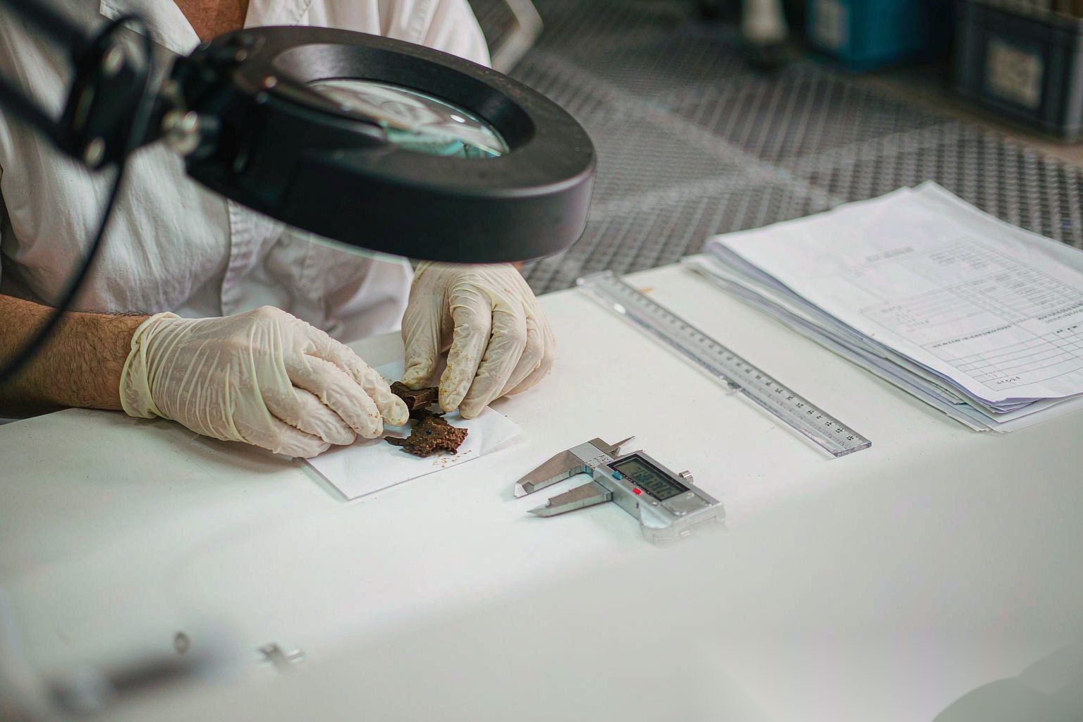 Quality inspector checking a product before packing